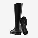 A black riding boot with a zipper, viewed from the side, showing both the upper and the tread of the sole.